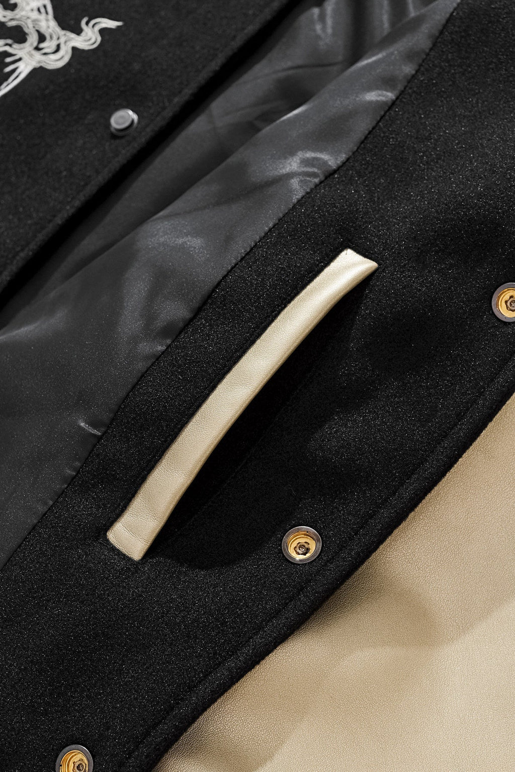 PT-055 original seller photo detail 009; Black Gold Qilin varsity
